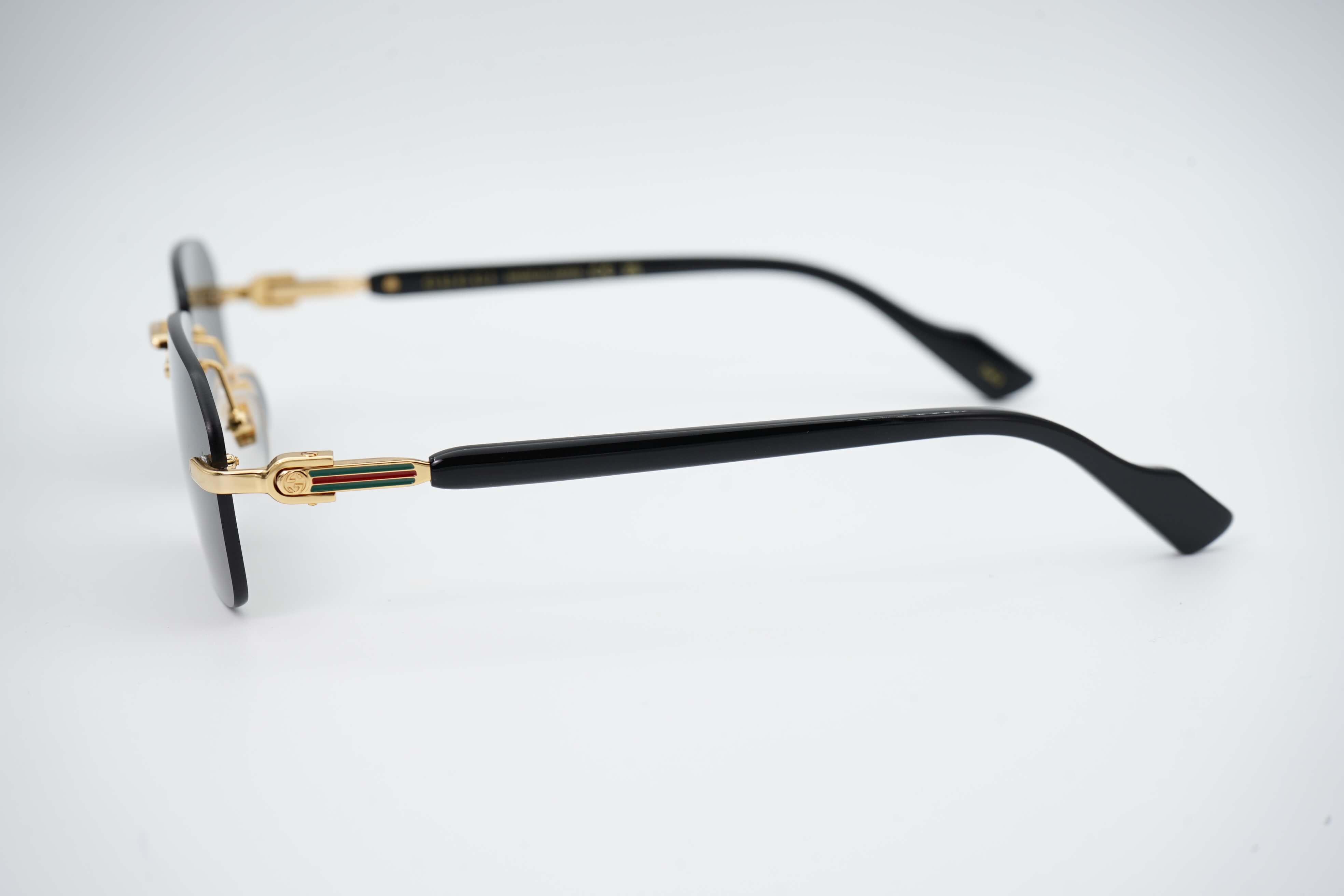 Gucci GG 1221S 001 – Óculos de Sol Quadrados em Preto e Dourado